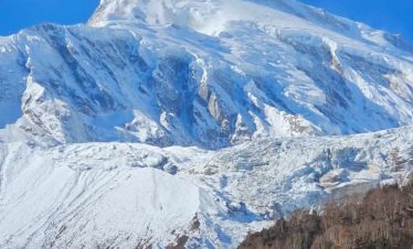 Solo trekker crossing Larkya La Pass Manaslu 2026